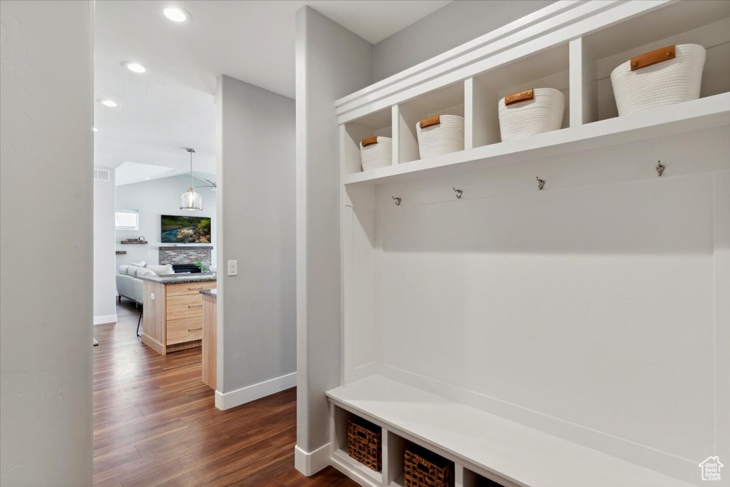 Mudroom featuring baseboards, dark wood-style floors, recessed lighting, and vaulted ceiling