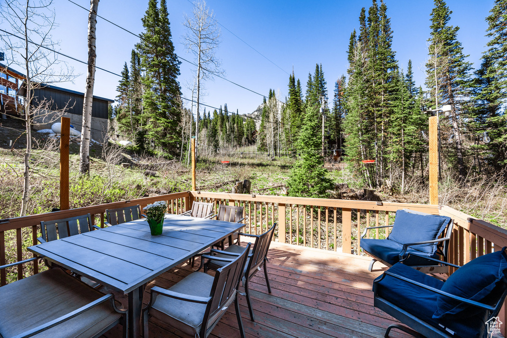 Wooden deck with outdoor dining area