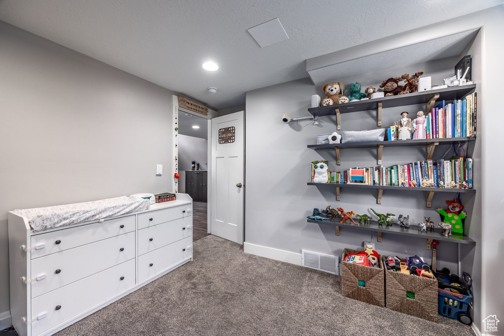 Bedroom with carpet, baseboards, and recessed lighting