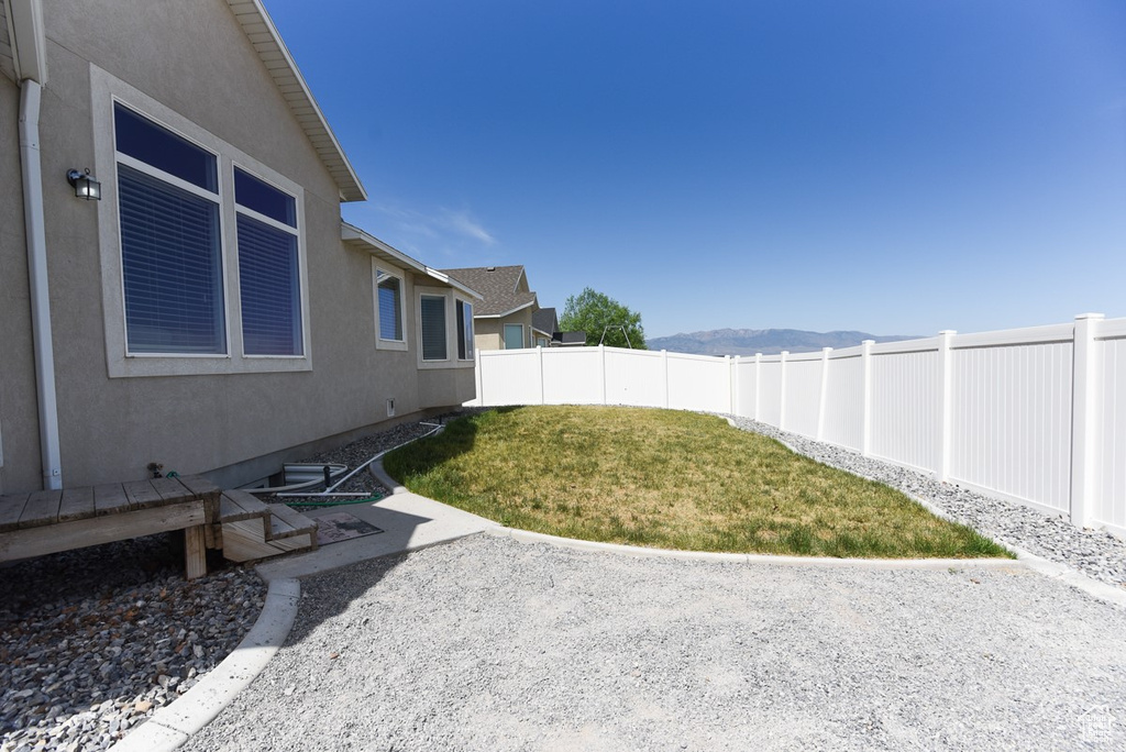 View of yard with a patio