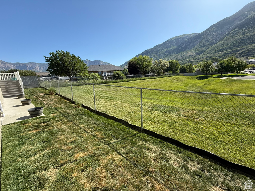 View of yard with a mountain view