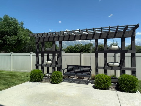 View of patio with a pergola