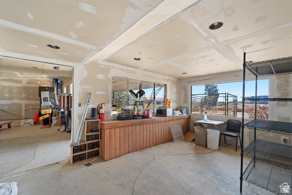 Miscellaneous room featuring concrete floors