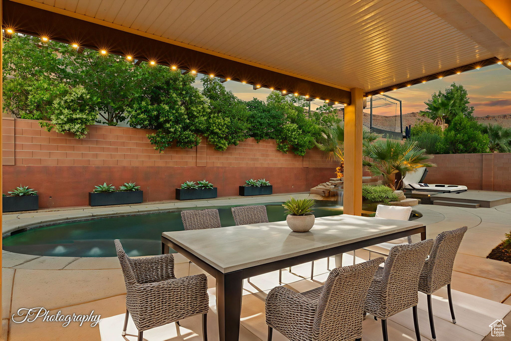 View of patio featuring outdoor dining area