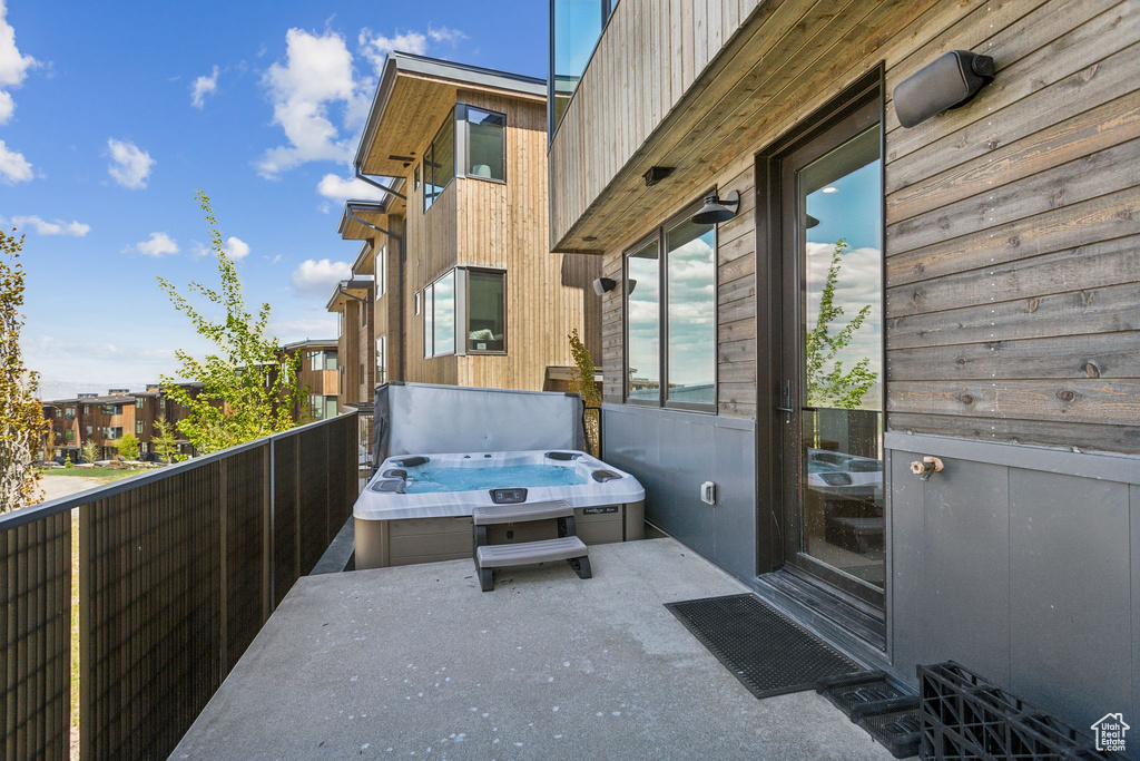 View of patio / terrace featuring a hot tub