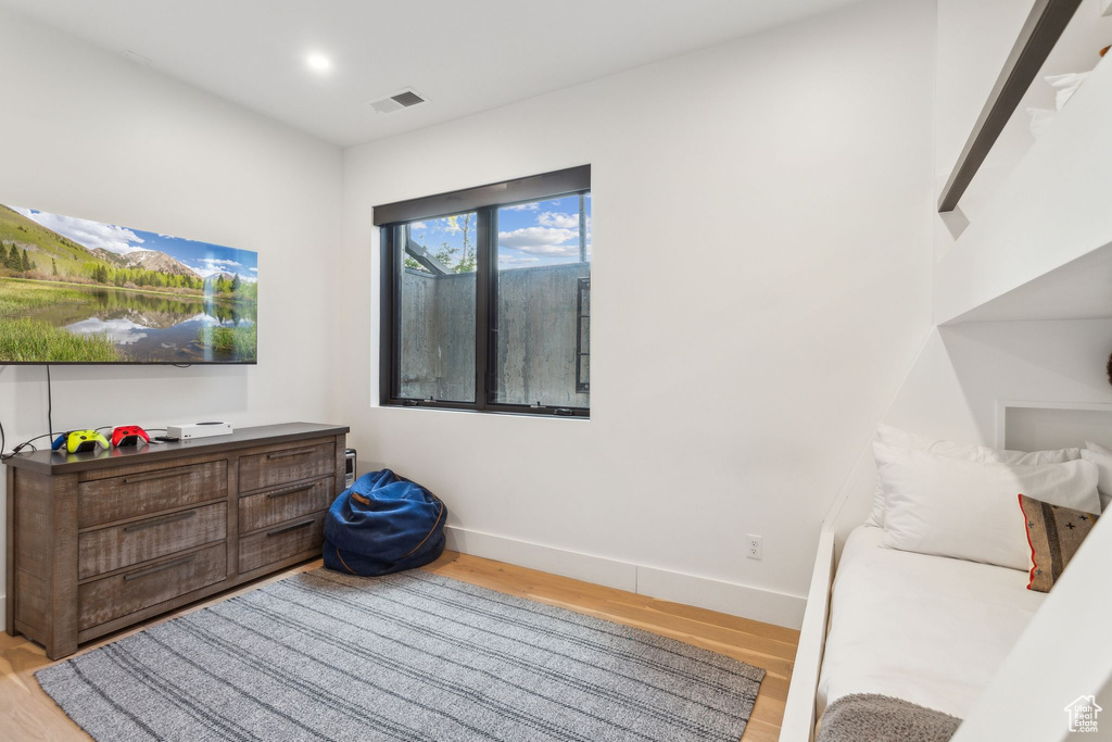 Living area featuring wood finished floors and baseboards