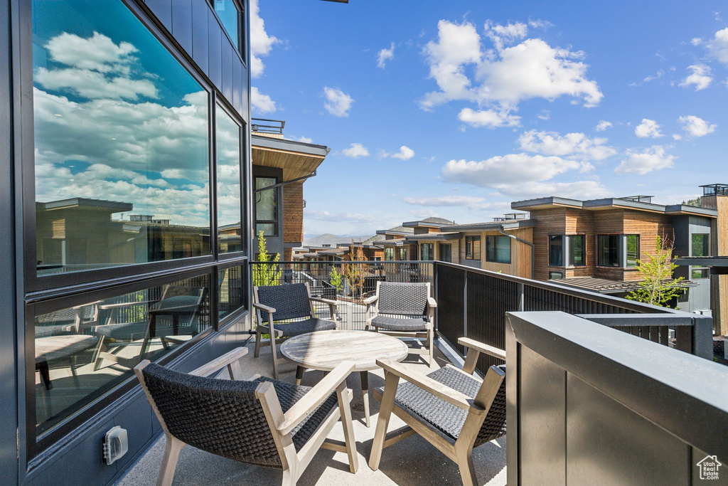 Balcony featuring a residential view