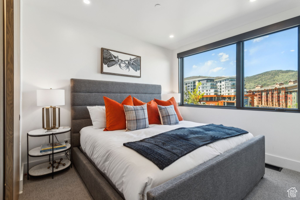 Bedroom with baseboards, carpet, and recessed lighting