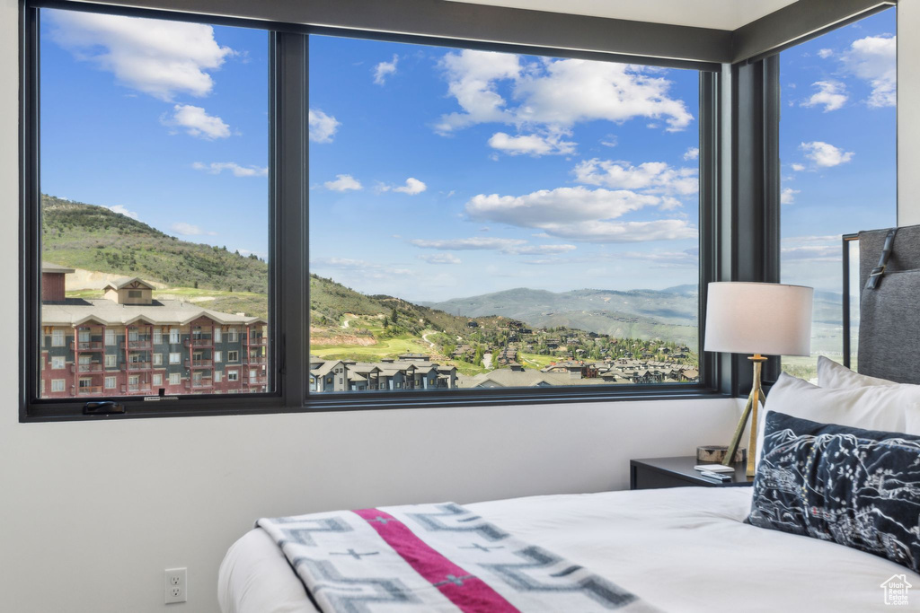 Bedroom featuring a mountain view