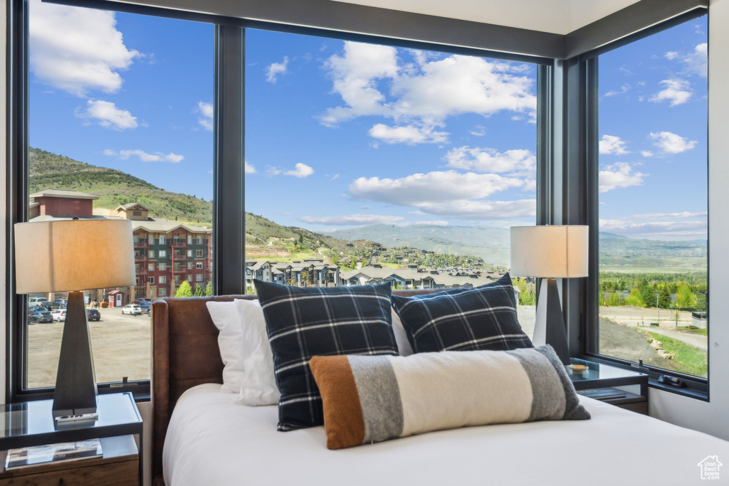 Bedroom featuring a mountain view