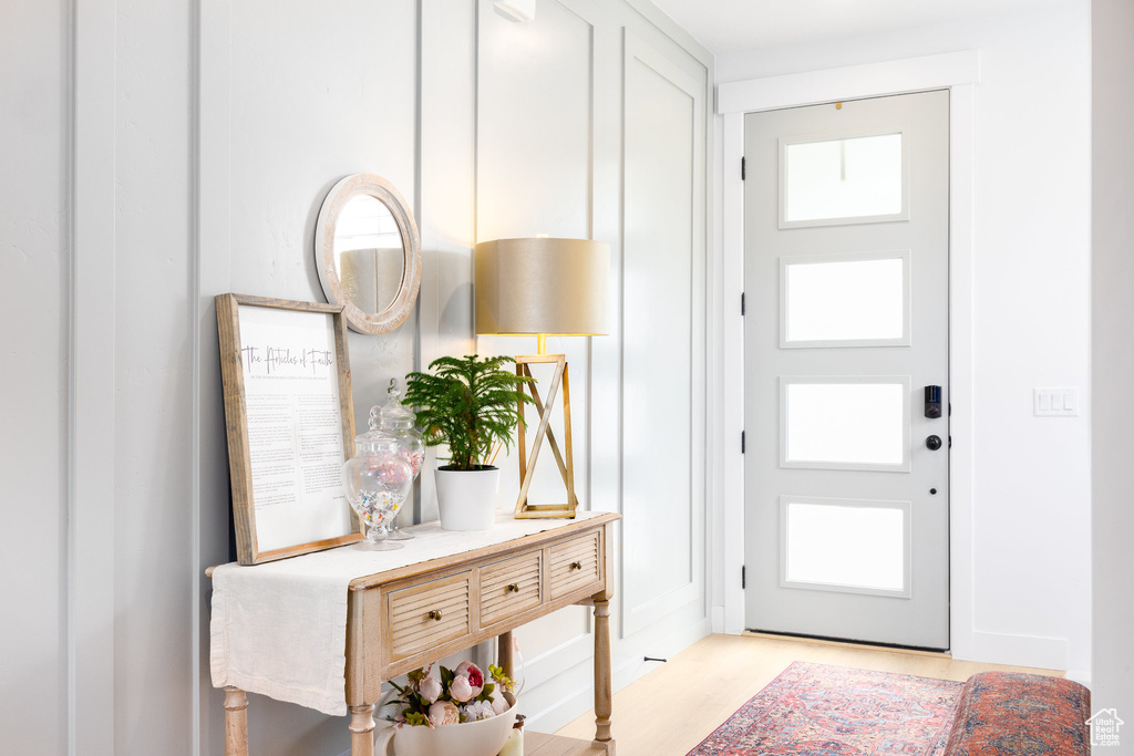 Entrance foyer with light wood finished floors