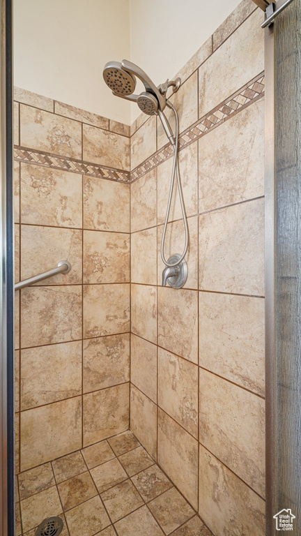 Full bath with a shower stall