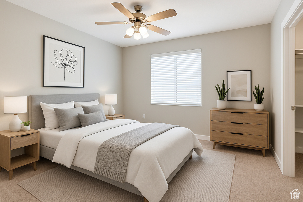Bedroom featuring light colored carpet, ceiling fan, and baseboards