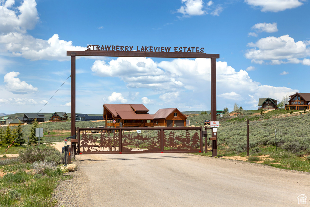 View of road featuring a gate