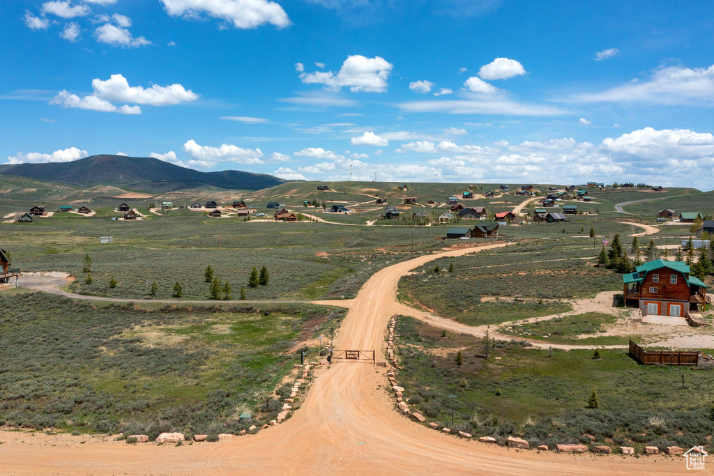 Aerial view of sparsely populated area featuring a mountainous background