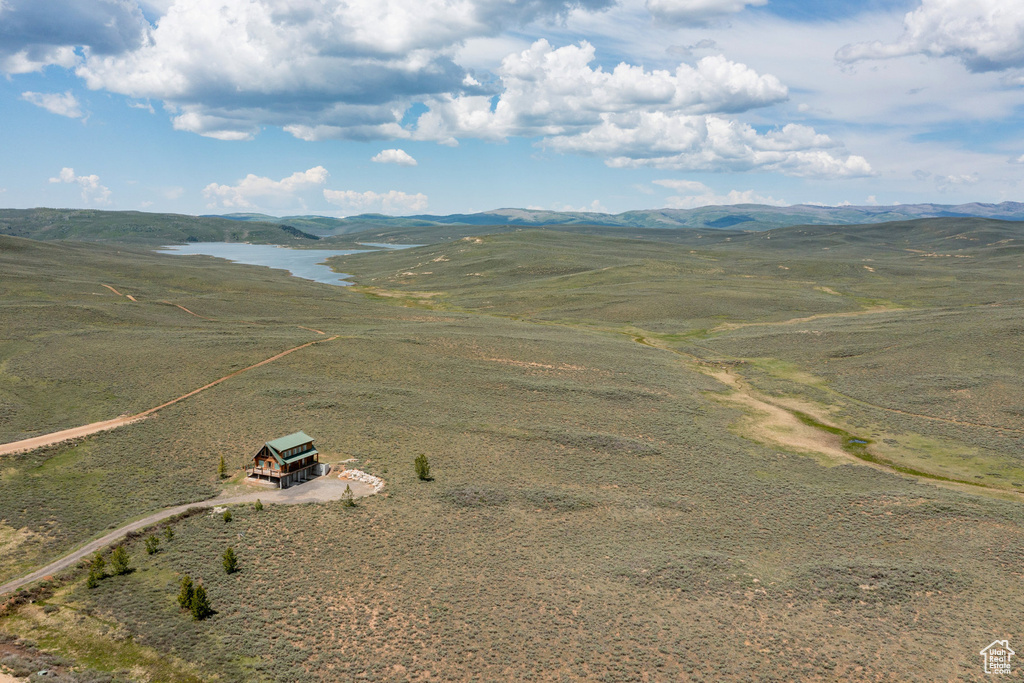 Aerial view of sparsely populated area with a mountainous background