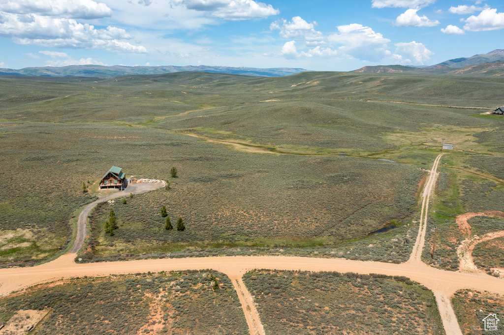 Overview of rural landscape with a mountain backdrop
