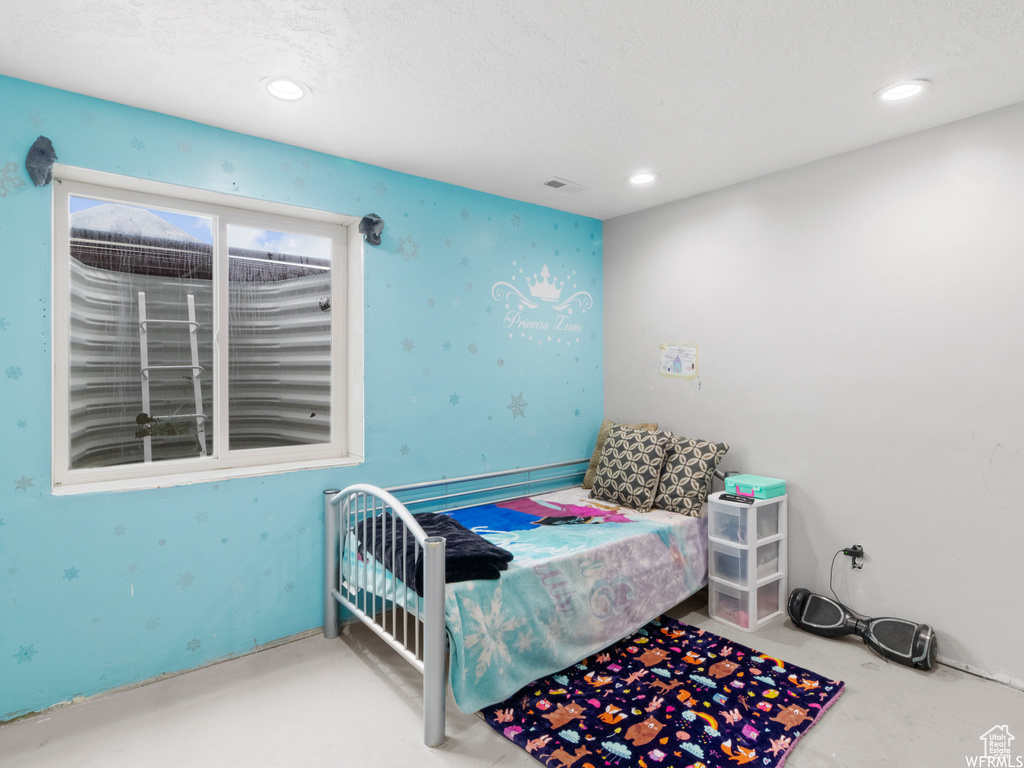 Bedroom featuring recessed lighting
