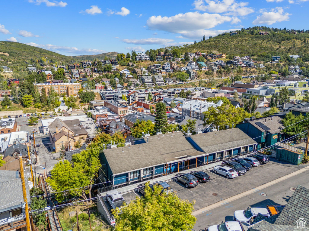 Aerial view of residential area featuring a mountain backdrop