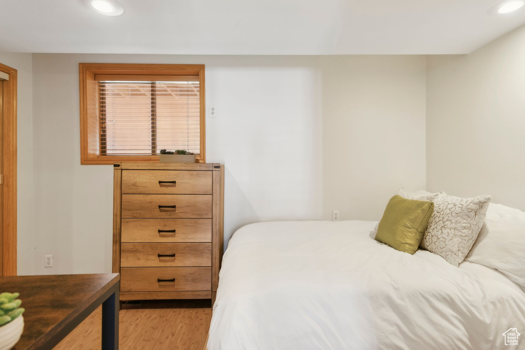 Bedroom featuring light wood-style flooring and recessed lighting