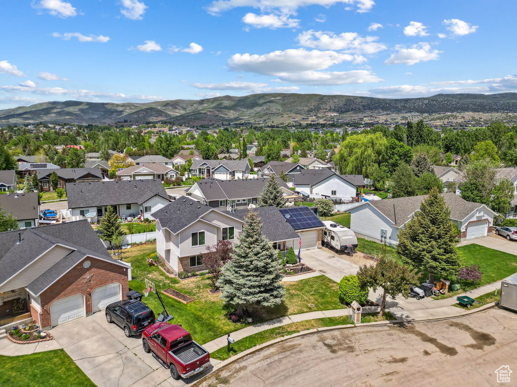 Aerial perspective of suburban area with mountains
