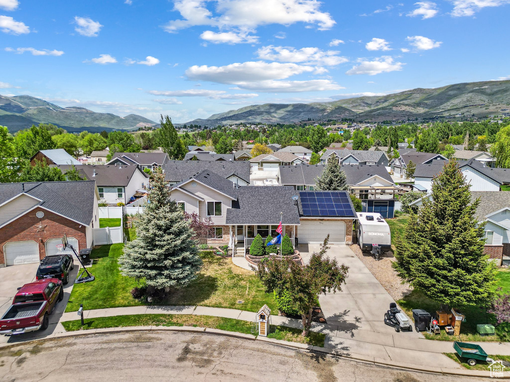 Aerial view of residential area with a mountain backdrop