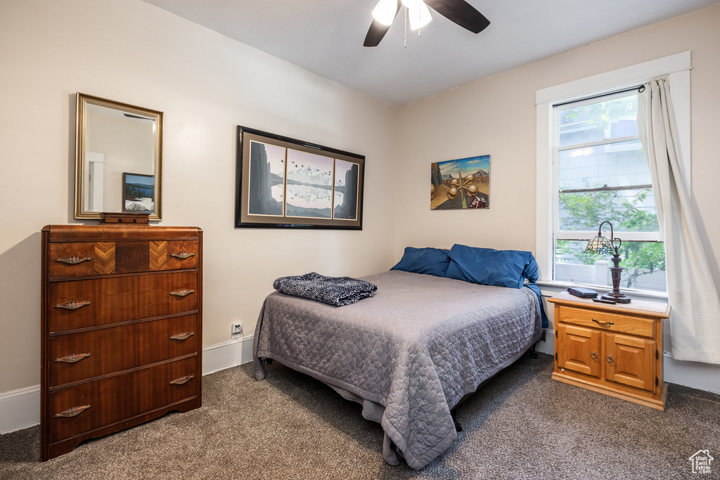 Bedroom with carpet floors and ceiling fan