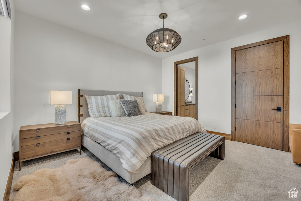 Bedroom with light colored carpet, recessed lighting, a chandelier, and baseboards