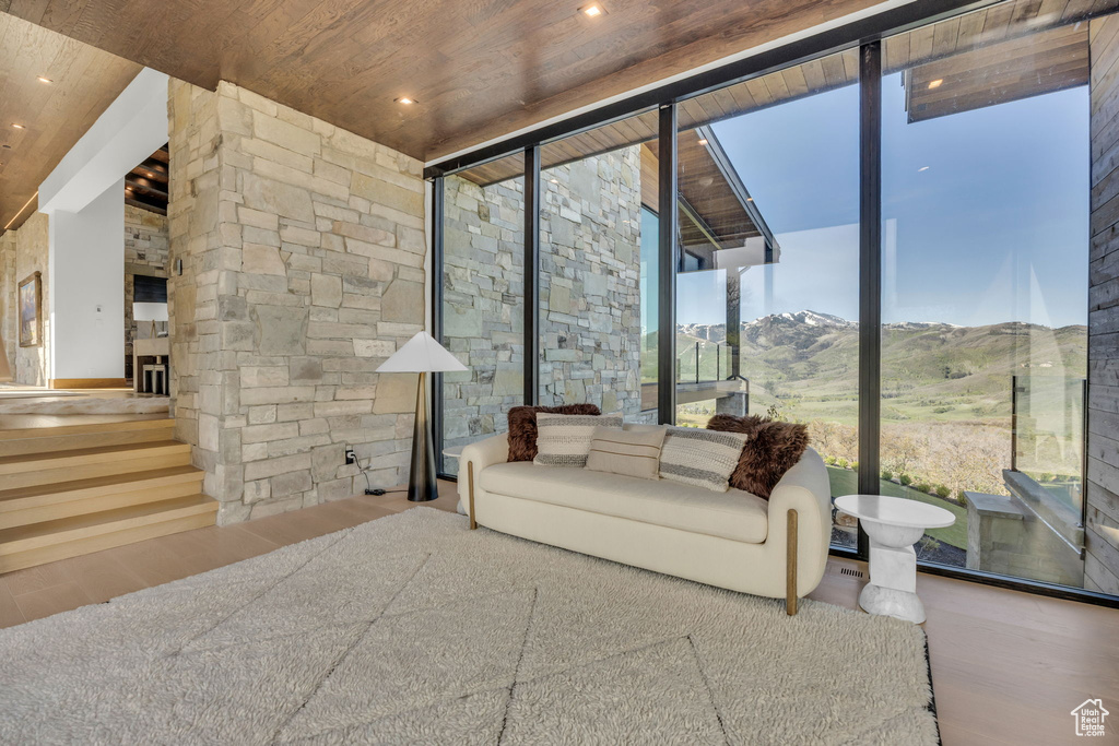 Sunroom / solarium with a mountain view