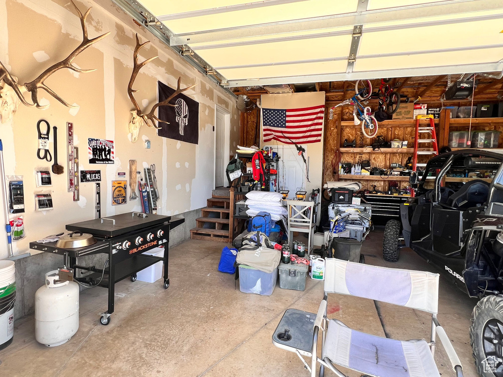 Garage featuring a workshop area