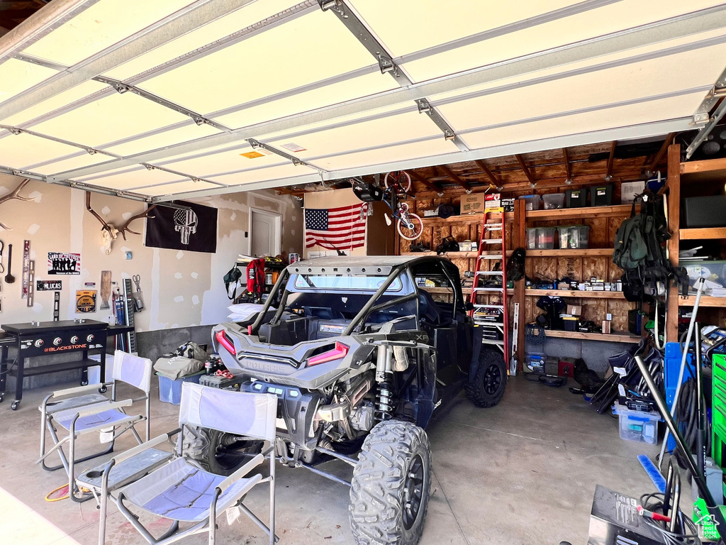 Garage featuring a workshop area