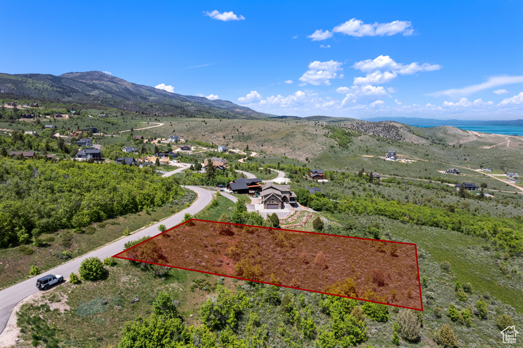 View of property location featuring property parcel outlined and a water and mountain view