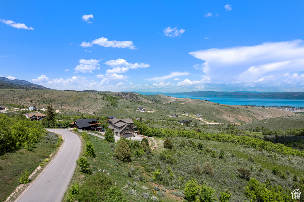 View of mountain background featuring a nearby body of water