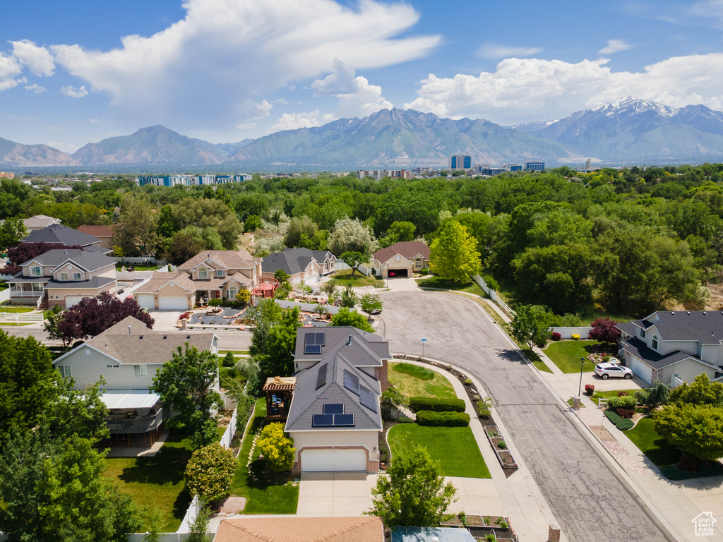 Aerial perspective of suburban area featuring mountains
