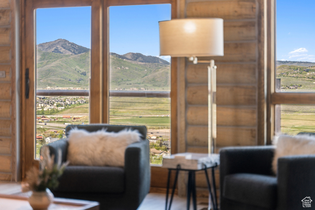 Sitting room with plenty of natural light and a mountain view