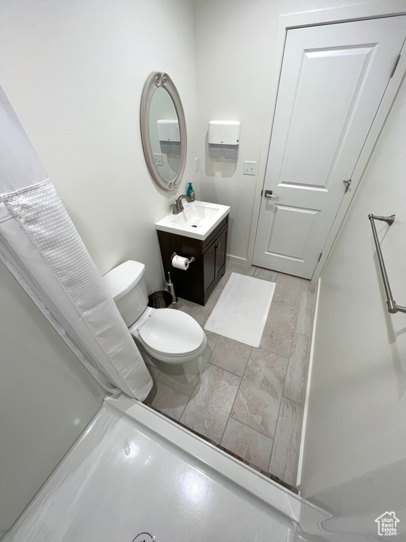 Bathroom featuring toilet and vanity