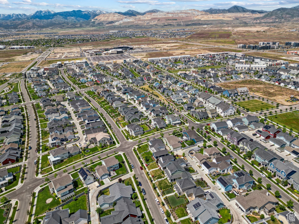 View of property location featuring a mountain backdrop and nearby suburban area