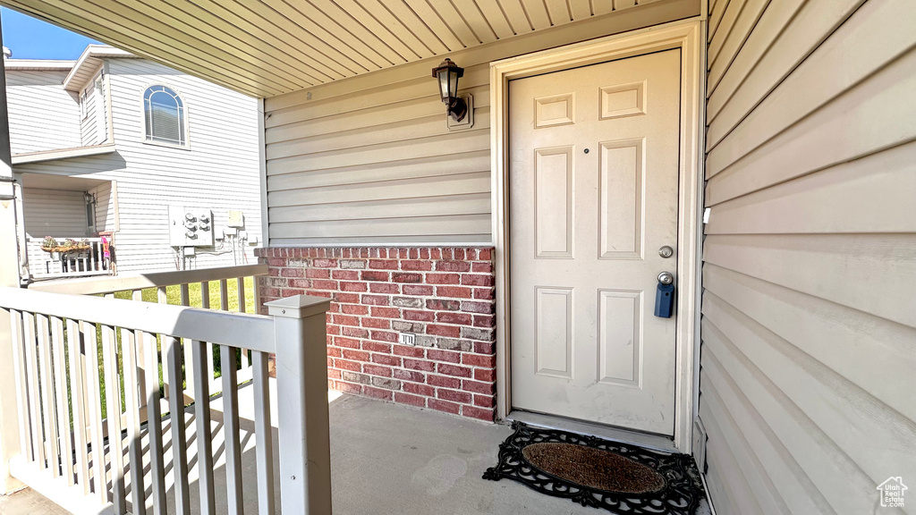 Entrance to property with covered porch