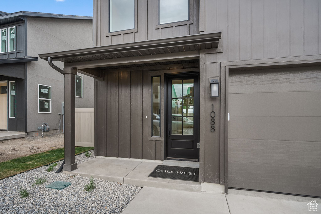 Property entrance with board and batten siding