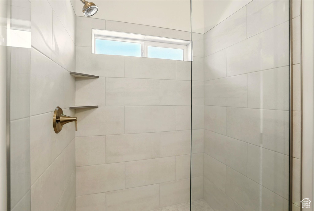 Bathroom with tiled shower
