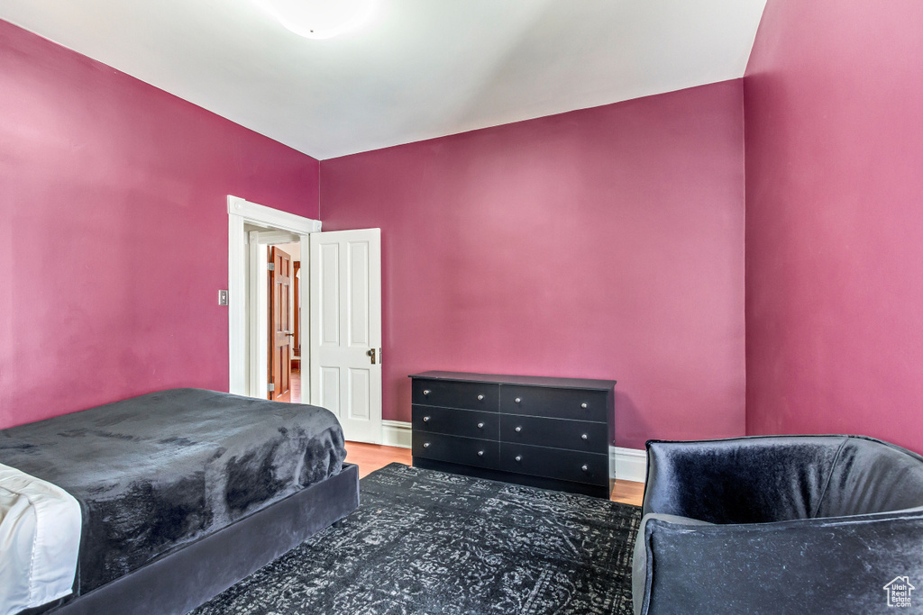 Bedroom with wood finished floors
