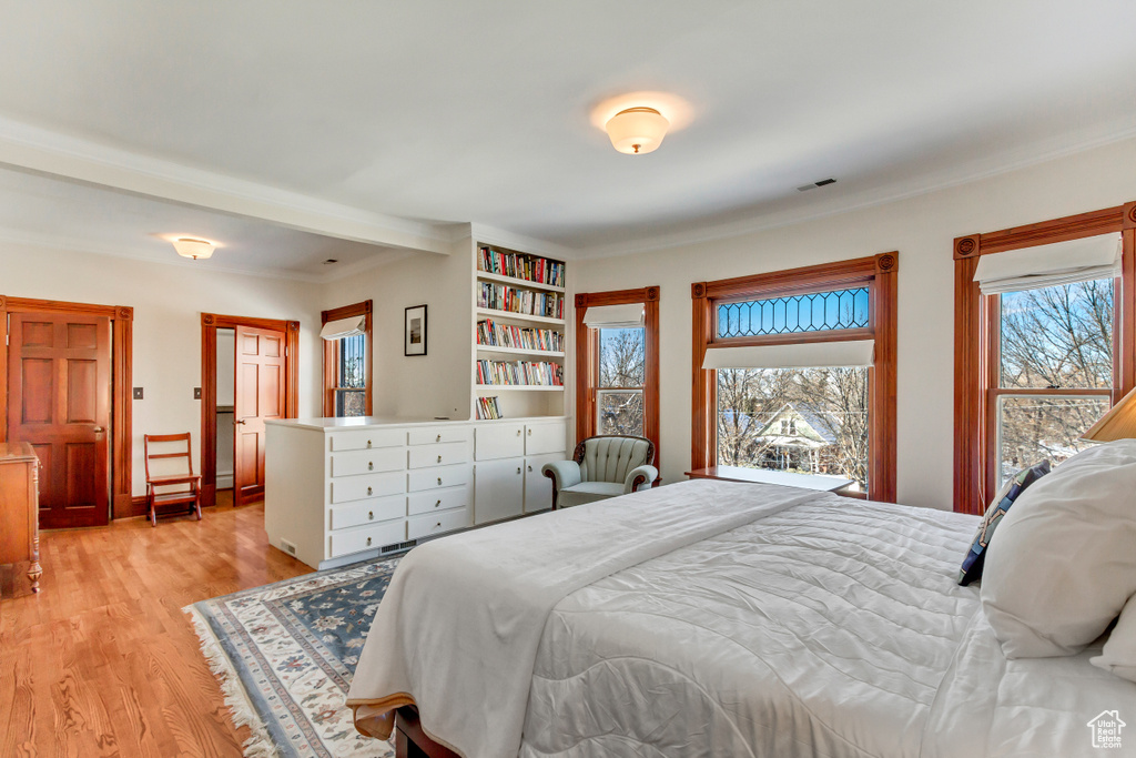 Bedroom with light wood-style floors