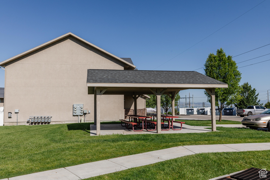View of home's community featuring a yard