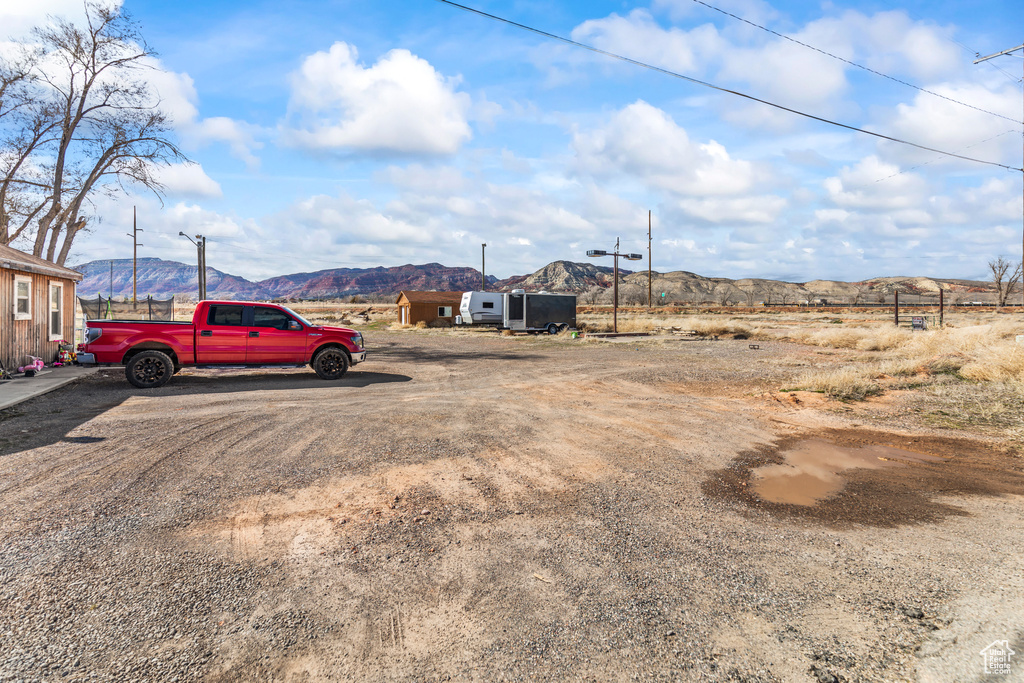 View of yard with a mountain view