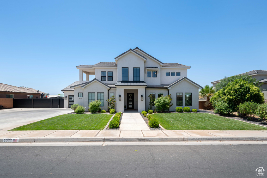 Modern inspired farmhouse with stucco siding