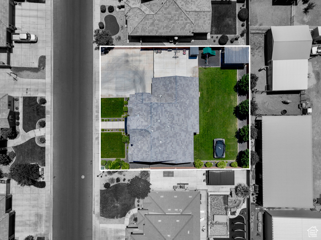Aerial view of property and surrounding area featuring property parcel outlined
