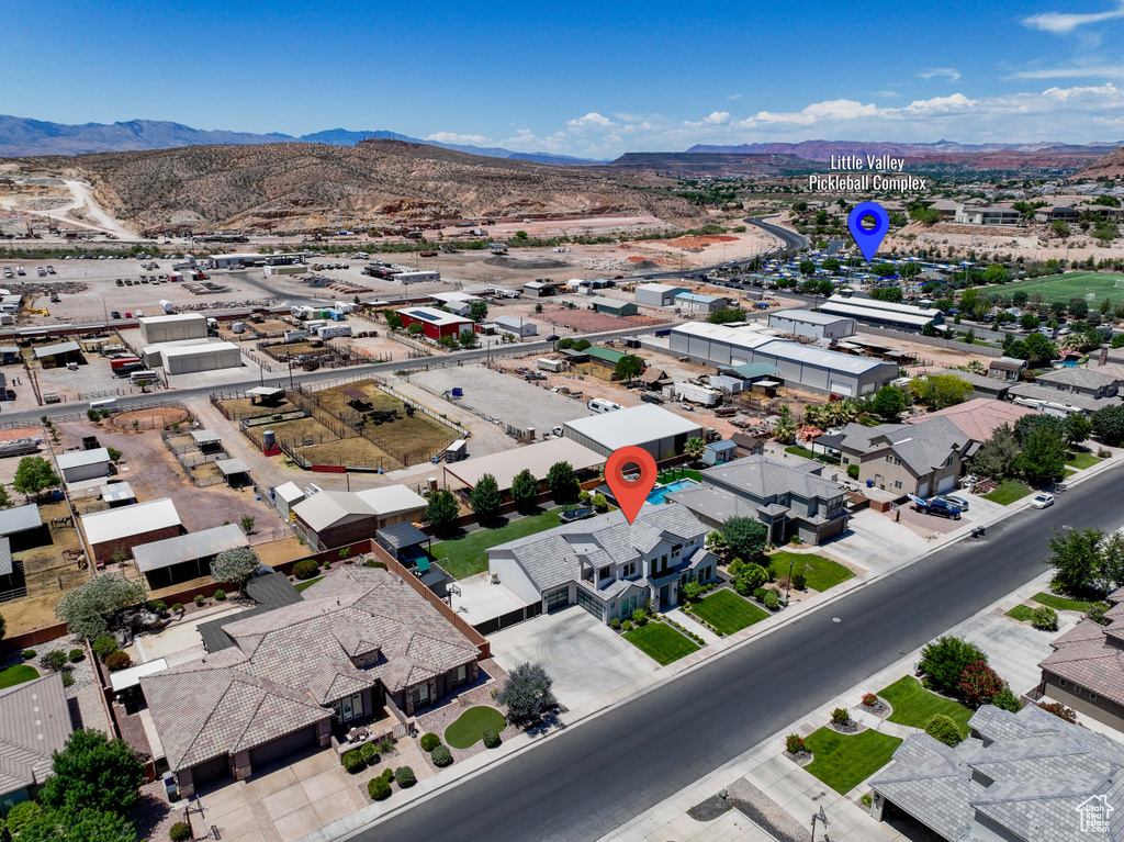 Aerial view of residential area with a mountain backdrop