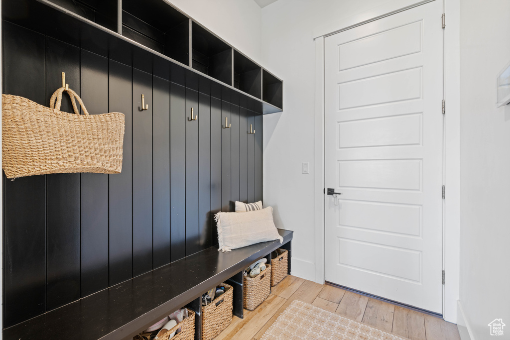 Mudroom featuring wood finished floors