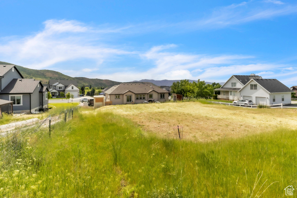 View of yard featuring a mountain view and a residential view