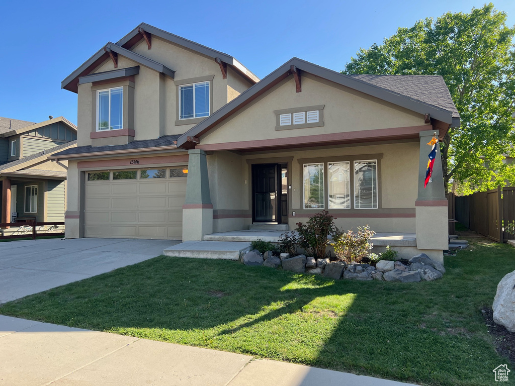 Craftsman inspired home featuring stucco siding, concrete driveway, and a garage